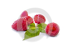 Delicious first class fresh raspberries isolated on white background