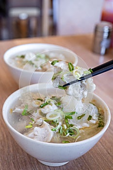 Delicious fish ball rice noodles in thick soup, common food in Tainan, Taiwan, Asia, Asian Taiwanese street delicacy cuisine,