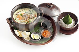 Delicious food call soto betawi soup with rice spicy chilly