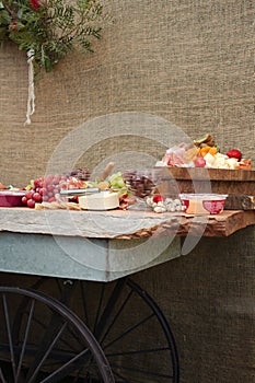 A Delicious Food Platter of Fruit, Nuts, Cheese, Dips, Deli Meat