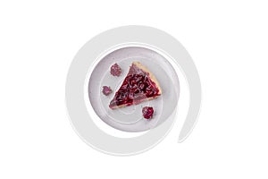 Delicious fragrant sweet pie with cherry berries on a ceramic plate