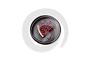 Delicious fragrant sweet pie with cherry berries on a ceramic plate