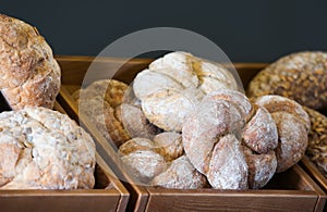 Delicious fresh bread on shelf in bakery