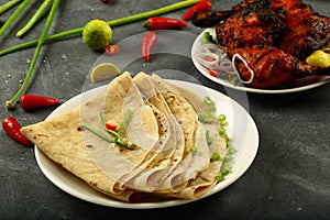 Delicious fresh chapati with tandoori chicken