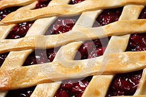 Delicious fresh cherry pie as background, closeup