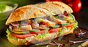 Delicious fresh chicken baguette with salad