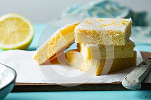 Delicious and fresh fudgy lemonies with lemon glaze and zest photo