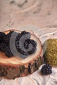 delicious fresh healthy and nutritious blackberries on Wooden Background