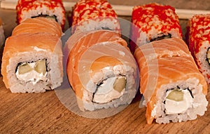 Delicious fresh Japanese sushi rolls .
