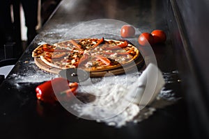 Delicious fresh pizza on black background