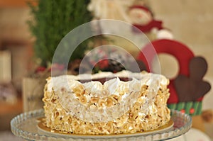 Delicious fresh raspberry hazelnut cake with Christmas decoration