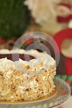 Delicious fresh raspberry hazelnut cake with Christmas decoration