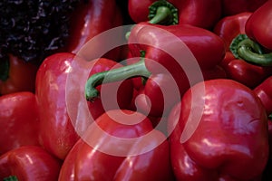 Delicious and fresh red Capsicums or red pepper vegetables on a fruit market