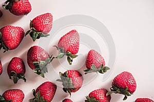 Delicious fresh red strawberries on white background, top view