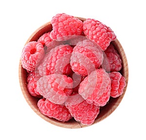 Delicious fresh ripe raspberries in bowl isolated, top view