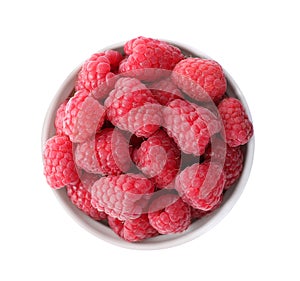 Delicious fresh ripe raspberries in bowl isolated, top view