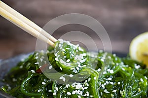 Delicious fresh seaweed salad   vegan   marinated  sesame seeds