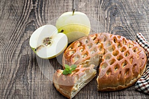 Delicious freshly baked apple pie isolated on white