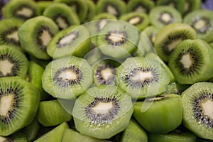 Delicious freshly cut kiwis on sale on market