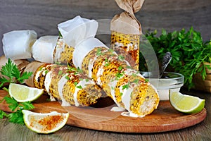 Grilled corn cobs photo