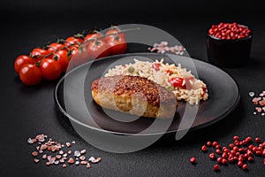 Delicious fried cutlets or meatballs of minced fish with rice