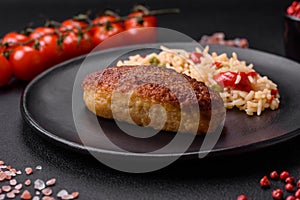 Delicious fried cutlets or meatballs of minced fish with rice