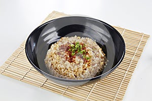 Delicious fried rice in a black color bowl
