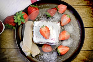 Delicious fruit cake, cremy strawberry cake closeup