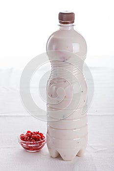 Delicious fruit, greek yogurt and granola parfaits on white background