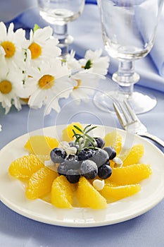 Delicious fruit salad with oranges,