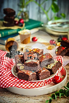 The delicious fudgy brownies on a table