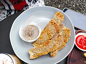 A delicious garlic bread with Herb sauce