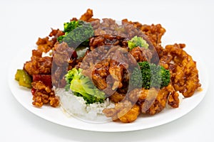 General Tso's Chicken with White Rice and Broccoli on a White Plate