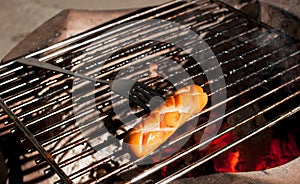 Delicious german sausages on the barbecue grill