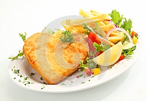 Delicious golden heart shape veal escalope photo