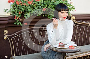 Delicious gourmet cake. Pamper yourself. Girl relax cafe with cake dessert. Woman attractive elegant brunette eat