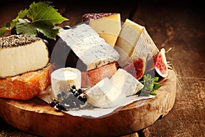 Delicious gourmet cheese platter photo