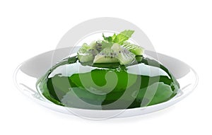 Delicious green jelly with kiwi slices on white