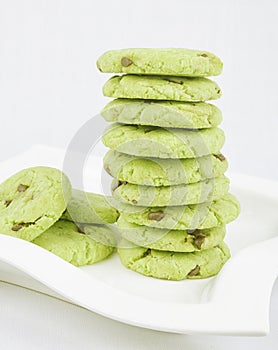 Delicious green pista cookies stacked to serve