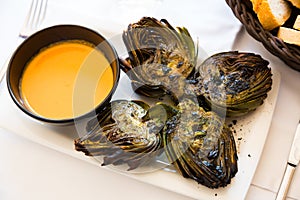 Delicious grilled artichoke halves