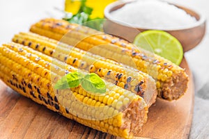 Delicious grilled corn with salt and parsley