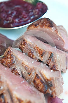 Delicious grilled duck fillets with its garnish