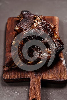 Delicious grilled ribs or roasted lamb rack seasoned with a spicy pepper basting sauce