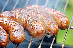 Delicious grilled sausages closeup