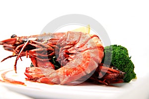 Delicious grilled seafood prawn shrimp food cuisine with broccoli on plate white background