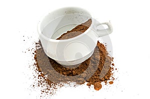 Delicious, ground coffee in a white cup on a white background