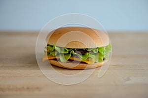 Delicious hamburger on wood