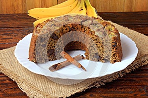 Delicious healthy banana cake organic homemade, gluten free, over rustic wooden table