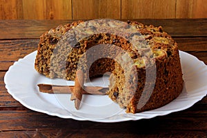 Delicious healthy banana cake organic homemade, gluten free, over rustic wooden table