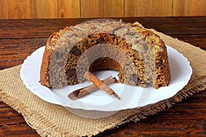 Delicious healthy banana cake organic homemade, gluten free, over rustic wooden table